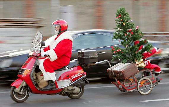 Image de Noël: Père Noël sur une moto