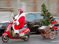 Père Noël sur une moto